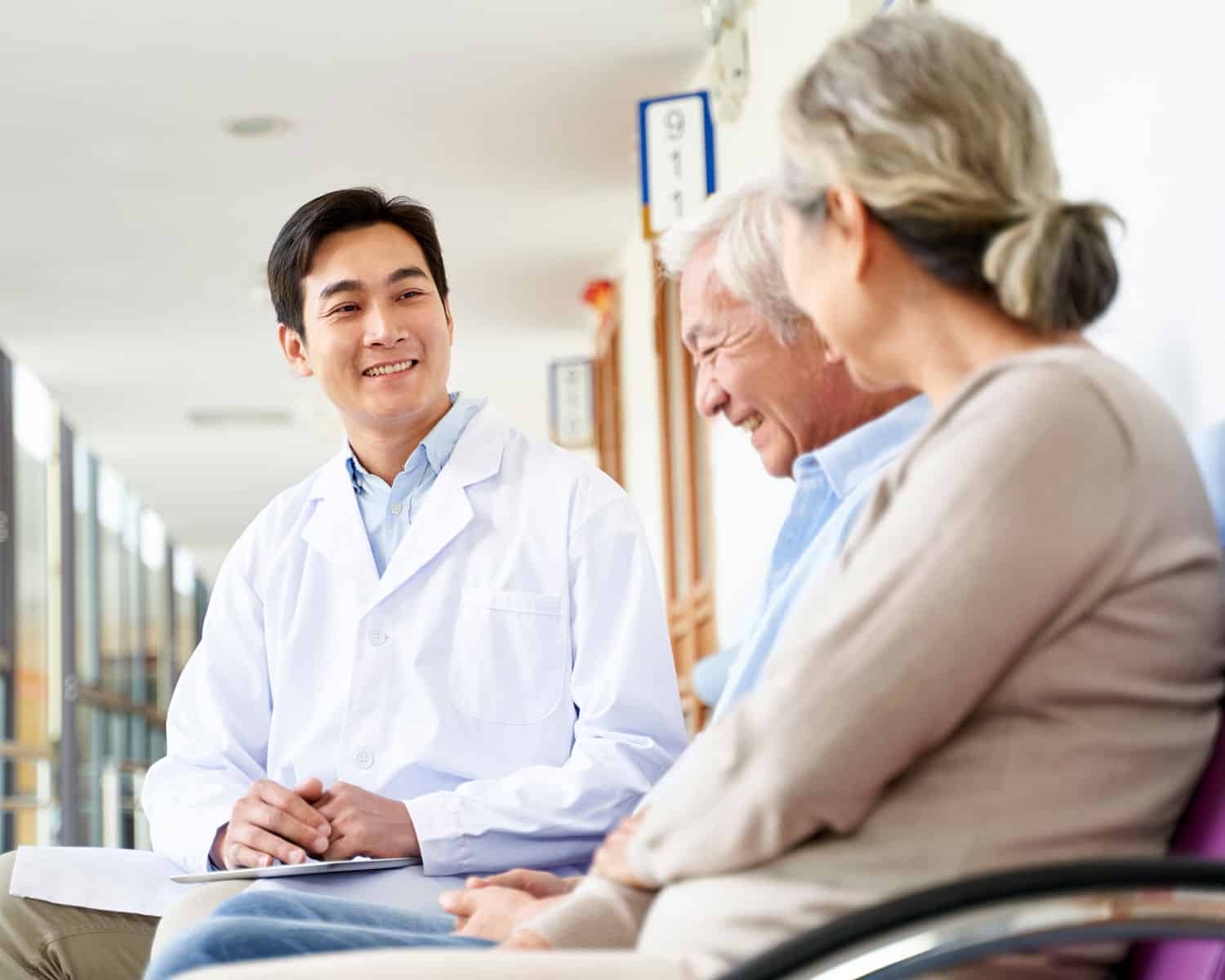 Doctor talking with patients