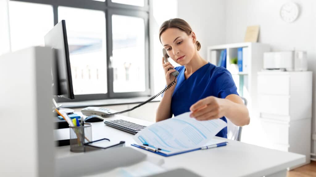 nurse talking over the phone